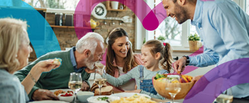 family having a meal around a table