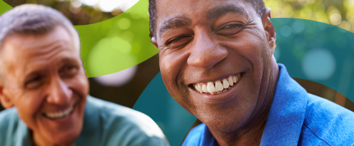 Two men smiling