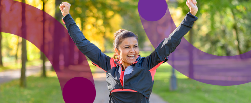 Woman celebrating finishing her race