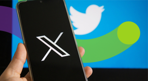 X logo on phone and Twitter logo on a laptop